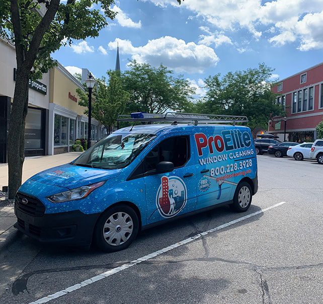 proelite window cleaning truck parked in downtown Michigan City